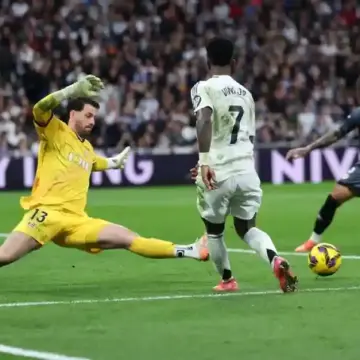 Kylian Mbappé and Vinícius Júnior played pivotal roles as Real Madrid secured a narrow victory over Rayo Vallecano.